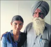  ?? HT PHOTO ?? Manpreet Kaur, who bagged 10th rank in the state and topped n Sangrur district, with her grandfathe­r.