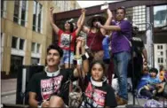  ?? THE ASSOCIATED PRESS ?? James Gutierrez, 15, and his sister, Lilah, 8, wore chains Saturday during a demonstrat­ion against the Trump administra­tion’s immigratio­n policies.