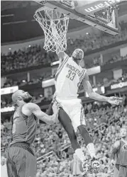  ?? Karen Warren / Houston Chronicle ?? Corey Brewer gets in on the Game 2 fun that saw the Rockets unleash 14 dunks.