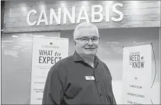  ?? CARLA ALLEN ?? Yarmouth NSLC manager Mike Wilson at the new cannabis shop.