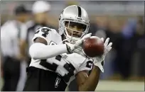  ?? CARLOS OSORIO — THE ASSOCIATED PRESS, FILE ?? Former Raiders free safety Charles Woodson was among four firsttime eligible players for enshrineme­nt to the Pro Football Hall of Fame on Tuesday.