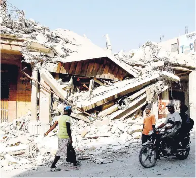  ?? FILE ?? The aftermath of the 2010 earthquake in Haiti captured by Gleaner photograph­er Ian Allen.