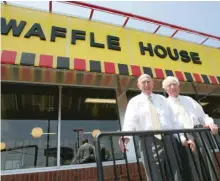  ??  ?? Waffle House founders Joe Rogers Sr., left, and Thomas Francis Forkner Sr. pose in front of a Waffle House restaurant in Norcross, Georgia, in 2005.
| AP FILES