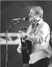  ??  ?? STURGILL SIMPSON, playing Friday, was among progressiv­e country singer-songwriter­s on the bill.