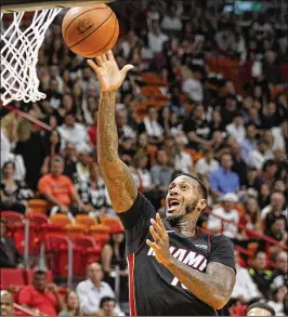  ?? PEDRO PORTAL / EL NUEVO HERALD ?? James Johnson, who has been with the Heat for less than 16 months, was elected by his teammates as one of three captains.