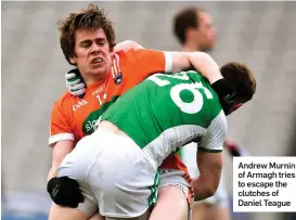  ??  ?? Andrew Murnin of Armagh tries to escape the clutches of Daniel Teague