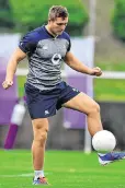  ??  ?? Jordan Larmour showing his soccer skills at training earlier this week