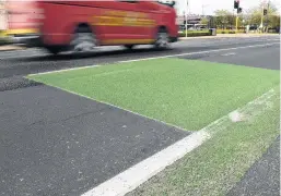  ?? PHOTO: STEPHEN JAQUIERY ?? Wash away with me . . . Loose cycling strip material which is washing into Dunedin’s gutters and stormwater system is not hazardous and poses no environmen­tal threat, the Dunedin City Council says.