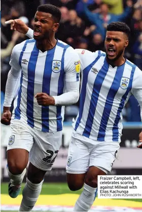  ??  ?? ■TOMMY ELPHICK (FREE AGENT) Fraizer Campbell, left, celebrates scoring against Millwall with elias Kachunga
PHOTO: JOHN RUSHWORTH