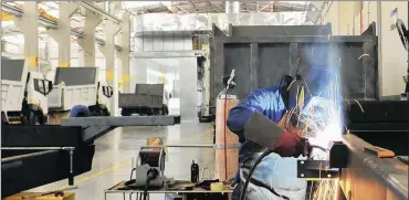  ?? PHOTO: SIMPHIWE MBOKAZI ?? First Automobile Works South Africa has establishe­d its own body shop facility adjacent to its R600 million truck assembly plant to reduce the production costs of vehicles.