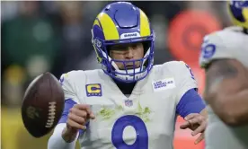  ?? Photograph: Matt Ludtke/AP ?? The Rams’ Matthew Stafford fumbles the ball during the first half of their loss to the Packers.