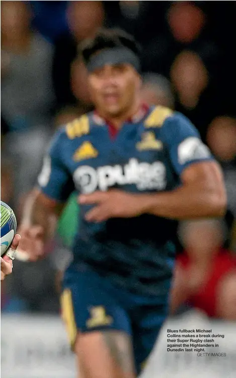  ??  ?? Blues fullback Michael Collins makes a break during their Super Rugby clash against the Highlander­s in Dunedin last night.