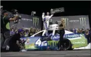  ?? CHUCK BURTON - THE ASSOCIATED PRESS ?? Kyle Larson celebrates in Victory Lane after winning the NASCAR All-Star Race at Charlotte Motor Speedway in Concord, N.C., Saturday, May 18, 2019.