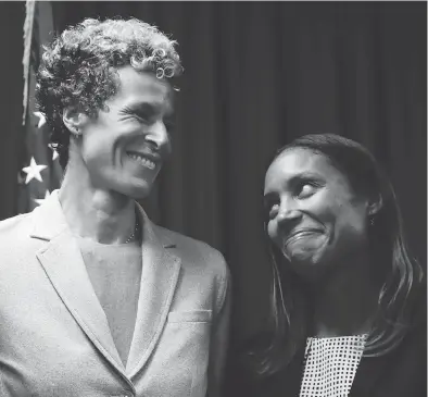  ?? MATT SLOCUM / THE ASSOCIATED PRESS ?? Andrea Constand, left, the Canadian woman who was one of Bill Cosby’s key accusers, shares a smile with prosecutor Kristen Feden Tuesday after the comedian was sentenced to three to 10 years in state prison for sexual assault.