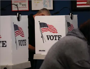  ?? PHOTOS BY TESS KENNY — MONTEREY HERALD ?? Voters cast their ballots for the 2022Califo­rnia Primary Election at the Monterey County Elections Office in Salinas.