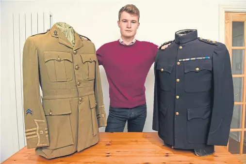  ?? Photograph by Kenny Elrick ?? HISTORY: Collector of wartime memorabili­a, Joshua Gill, with uniforms including Major James Keith’s, left.