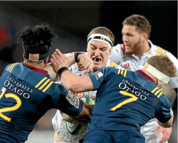  ??  ?? The Chiefs’ Brodie Retallick runs into some stern Highlander­s defence last night.