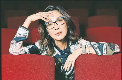  ?? CELESTE SLOMAN THE NEW YORK TIMES ?? “Asian communitie­s are so hungry; they never see themselves on the big screen,” says Crazy Rich Asians actor Michelle Yeoh.