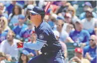  ?? JONATHAN DANIEL / GETTY IMAGES ?? The Braves possibly kept their playoff hopes alive by
acquiring outfielder Joc Pederson from the Cubs.