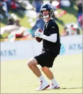  ?? AP-John Bazemore ?? Falcons quarterbac­k Matt Ryan throws a pass during training camp in Flowery Branch on Saturday. Ryan is eager to regain his MVP form with the Atlanta Falcons.