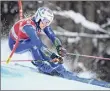  ?? Jure Makovec / Getty Images ?? Marta Bassino held off Tessa Worley in the second run for the giant slalom title.