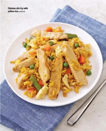  ?? PERDUE ?? Chicken stir-fry with yellow rice.