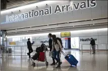  ?? MATT DUNHAM / ASSOCIATED PRESS ?? Britain’s airports are much less busy than they would otherwise be, but the traditiona­l summer getaway to sun-drenched beaches was set for a revival Friday as quarantine restrictio­ns were removed for dozens of countries.