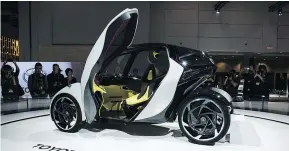  ?? — THE CANADIAN PRESS FILES ?? The Toyota i-TRIL concept car features ‘active lean technology’ and weighs just 600 kilograms.