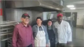  ?? SUBMITTED PHOTO ?? Husband and wife owners of Cherry Street Kitchen John Vadnais and Barbara Simpson (left) with Tara Senski and Lewis Parham. Senski and Parham use the kitchen to prepare food for their businesses.