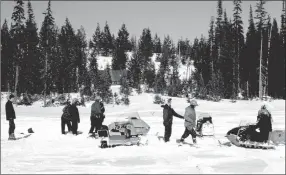  ?? Special to The Daily Courier ?? An early search and rescue exercise at Hidden Lake, near Penask Mountain, is shown in this photo from the Kelowna branch of the Okanagan Historical Society.