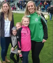  ??  ?? Sisters Katie and Gillian Lucid with Jack O Rourke,Lauren Lucid and Abbie Boyle celebratin­g a Ballyduff victory at Austin Stack Park on Sunday. Photo Moss Joe Browne.