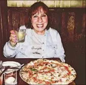  ??  ?? Miriam Weiskind’s mother, Hyla Weiskind enjoying a pizza.