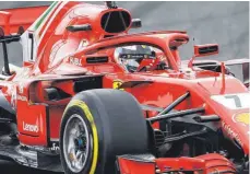  ?? FOTO: DPA ?? Bei Ferrari wird der sogenannte Halo ins Fahrzeugde­sign integriert – durch die Farbe. Der Widerstand gegen den Schutz ist groß.