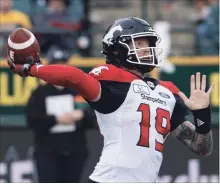  ?? JASON FRANSON THE CANADIAN PRESS ?? Calgary Stampeders quarterbac­k Bo Levi Mitchell fires away against the Edmonton Eskimos last Saturday in Edmonton.