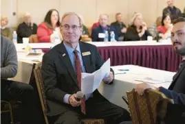  ?? CHICAGO TRIBUNE ?? Illinois GOP Chair Don Tracy listens to concerned citizens on the direction of the GOP during a strategizi­ng meeting at Bolingbroo­k Golf Club on Dec. 10, 2022.