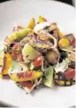  ?? Jason Henry ?? Summer stone fruit goes into panzanella made by Melissa Perello.
