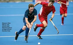  ??  ?? Massey’s Mac Wilcox, left, shoots past Matt Brougham of High School Hockey Club.