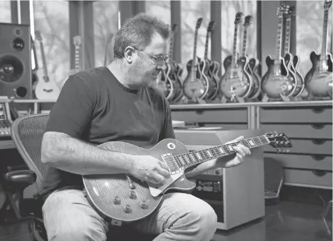  ?? PHOTOS BY DAMIEN ROGERS ?? Country music star and museum ambassador Vince Gill with one of 34 “Golden Era” Gibson Les Paul Sunburst guitars.