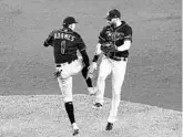  ?? KATHY WILLENS/AP ?? Shortstop Willy Adames and center fielder Kevin Kiermaier celebrate after the Rays defeated the New York Yankees 5-2 on Wednesday at Yankee Stadium.