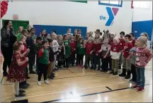  ??  ?? Students put on a Christmas concert at the Oneida Family YMCA.