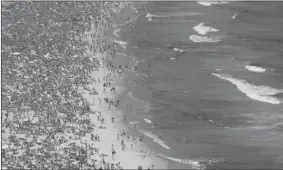  ?? ASSOCIATED PRESS FILES ?? The fabled Ipanema Beach gets very crowded, but in a city full of beaches it’s not difficult to find a secluded spot like Grumari, the furthest out and most secluded.