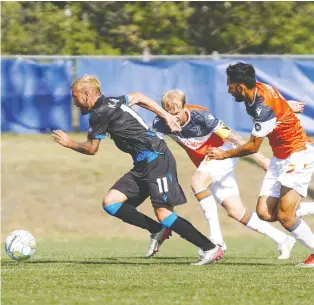  ??  ?? Veteran FC Edmonton striker Keven Aleman, shown here in a match with Forge FC earlier this summer, opted for a low-percentage shot in Wednesday’s loss to Halifax instead of passing to teammate Antony Caceres, who was open near the goal.