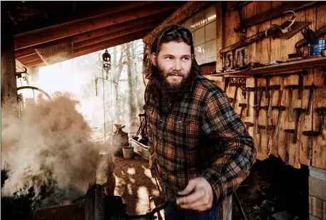  ?? History Channel/ ZACH DILGARD ?? Daniel Casey, a blacksmith in Romance, stars in the History Channel show Iron & Fire.