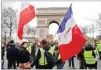  ??  ?? KAMIL ZIHNIOGLU/AP Protesters gather in Paris, France, on March 2, 2019.