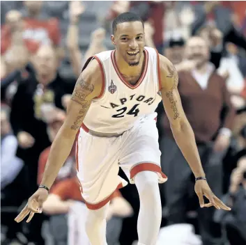  ?? FRANK GUNN/THE CANADIAN PRESS FILES ?? Toronto Raptors’ guard Norman Powell celebrates after scoring a three-pointer during second half Round 1 NBA playoff basketball action against the Indiana Pacers, in Toronto, on May 1, 2016.