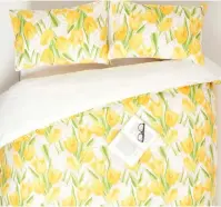  ?? ?? Yellow tulips digitally printed cotton duvet set, from £49.99, single, to £89.99, super king, Homescapes Online