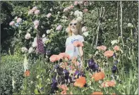  ?? PICTURES: JONATHAN GAWTHORPE ?? BLOOMING SPECTACLE: Clockwise from top, head gardener Andrea Jones in the rockery at Sheffield Botanical Gardens; eight-year-old Isabel Fyfe stands amongst the blooms; gardener Paul Martin painting the attraction’s water fountain.