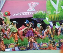  ??  ?? ST PETERSBURG: Performers take part in the opening ceremony of the 2017 Confederat­ions Cup football tournament at the Krestovsky Stadium in SaintPeter­sburg yesterday. — AFP