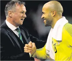  ??  ?? Key man: Northern Ireland manager Michael O’Neill with Republic goalkeeper Darren Randolph after the match