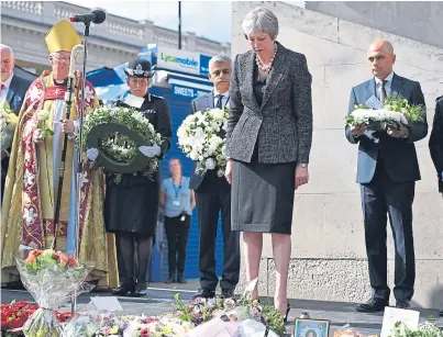  ?? Pictures: Getty. ?? Prime Minister Theresa May was among the dignitarie­s who paid their respects.